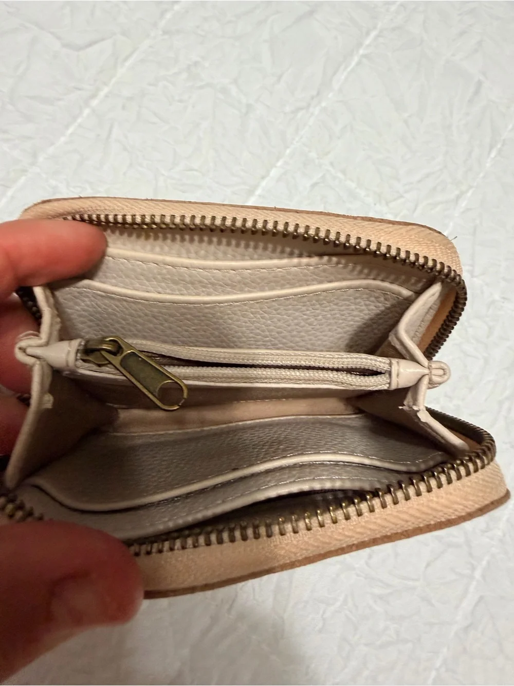 The Sak Metallic Rose Gold Compact Zip Wallet